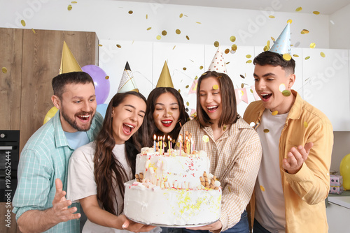 Group of young friends with...