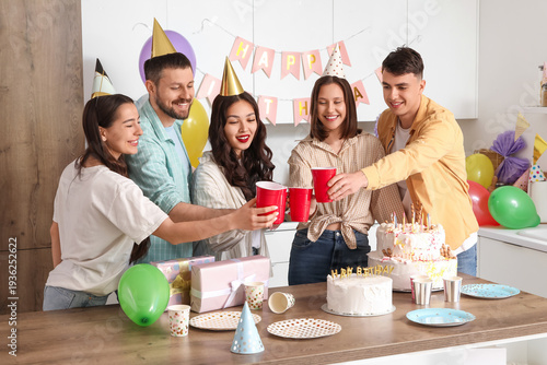 Group of young friends with...