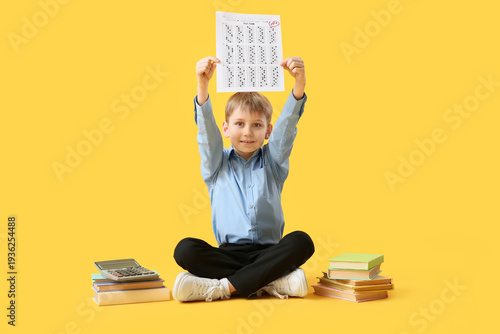Happy schoolboy with books ...