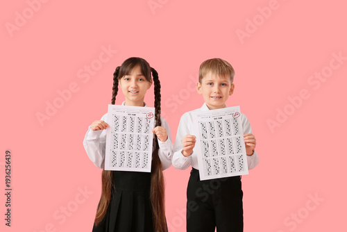 Happy little pupils with go...
