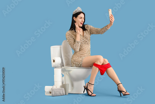Prom queen taking selfie on...