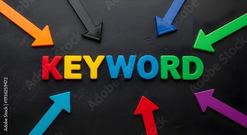 Colorful Keyword Text with Arrows on Dark Background – SEO and Digital Marketing Concept