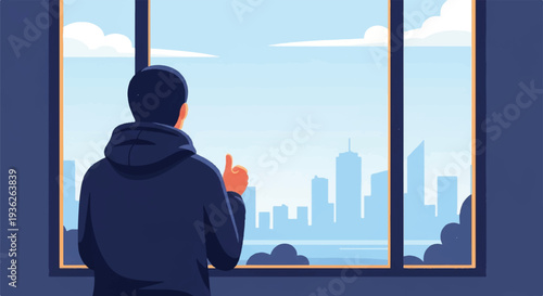 Young man in a dark hoodie stands by a large window, gazing at a distant city skyline, contemplating urban life and the future.