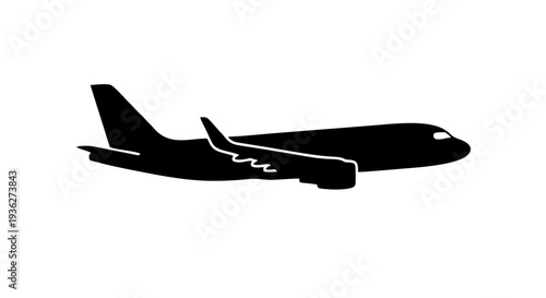 Jet's silhouette in flight: A sleek black jet plane soars across the sky. Capturing travel and modern aviation