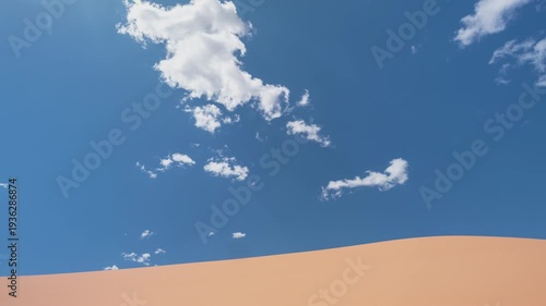 Clouds Moving Over Pink Coral Sand Dunes, Utah Desert Time-lapse
