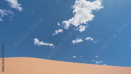 Clouds Moving Over Pink Coral Sand Dunes, Utah Desert Time-lapse
