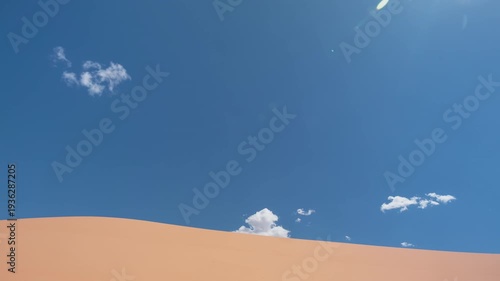 Clouds Moving Over Pink Coral Sand Dunes, Utah Desert Time-lapse
