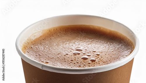 close up of a paper cup filled with frothy coffee on a white background