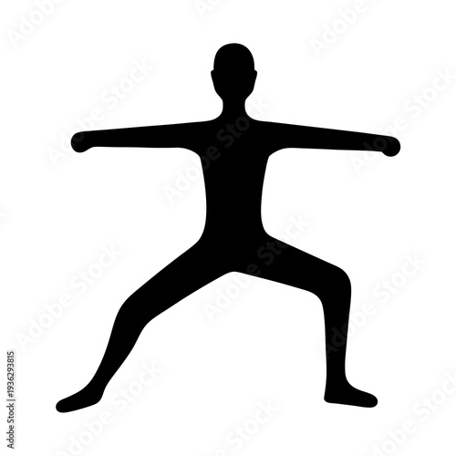 Silhouette of person in Warrior II pose expressing strength and balance in yoga