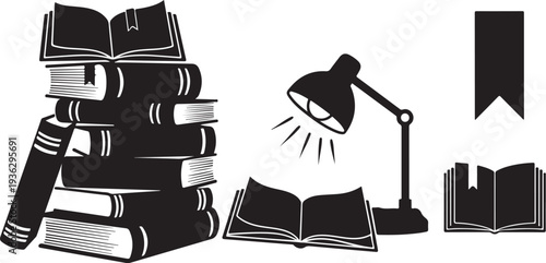 Stack of books with lamp and reading materials nearby