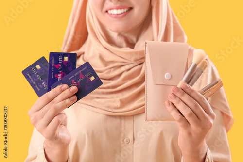 Young Muslim woman with cre...