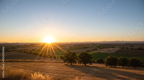 A serene night sky with countless stars illuminates a vast rural landscape