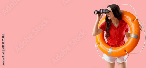 Female beach rescuer with l...