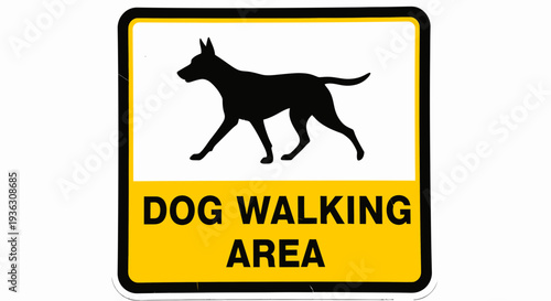A dog walking sign with a black dog silhouette stands in an outdoor area