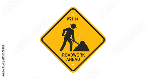 Construction worker holding shovel on roadwork ahead sign on highway