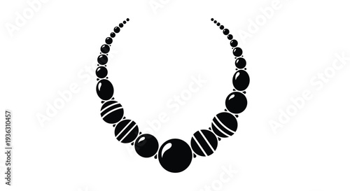 Black necklace with circular beads arranged in a crescent shape
