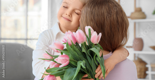 Cute little girl hugging he...