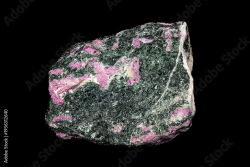 Sample of ruby zoisite from Tanzania. Also called Anyolite. Combination of red ruby crystals, green zoisite and dark green and black pargasite. 
