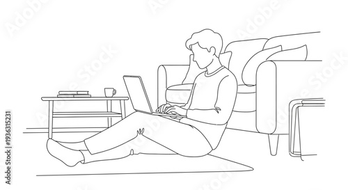 Young man sitting on floor using laptop computer at home.
