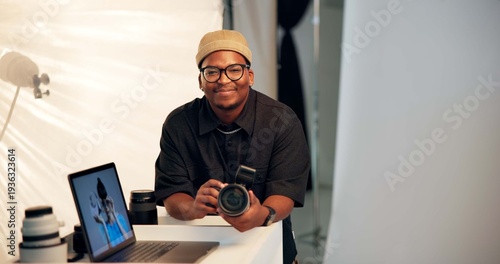 Photos Portrait, photographer and man in studio with camera, laptop and creative insight for media project