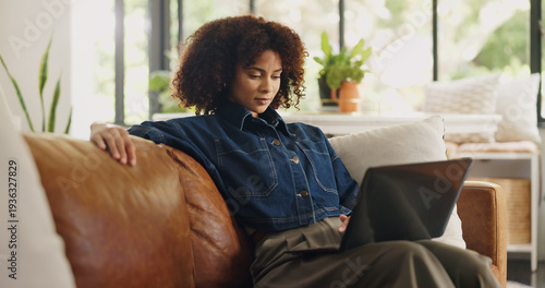Tableau sur toile Laptop, remote work and black woman on sofa in home for editing, story review and feedback
