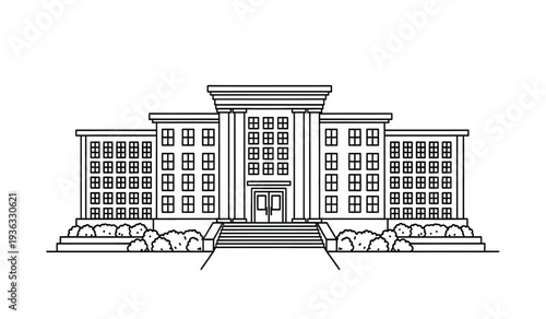 A large building with columns and many windows on the front facade