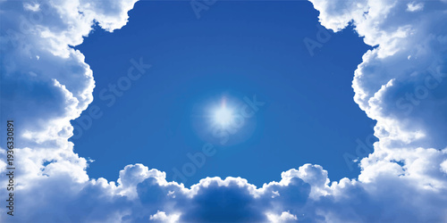 Fluffy white clouds float through the beautiful blue sky on a bright sunny summer day as sunlight illuminates the atmospheric beauty of this natural cloudscape heaven