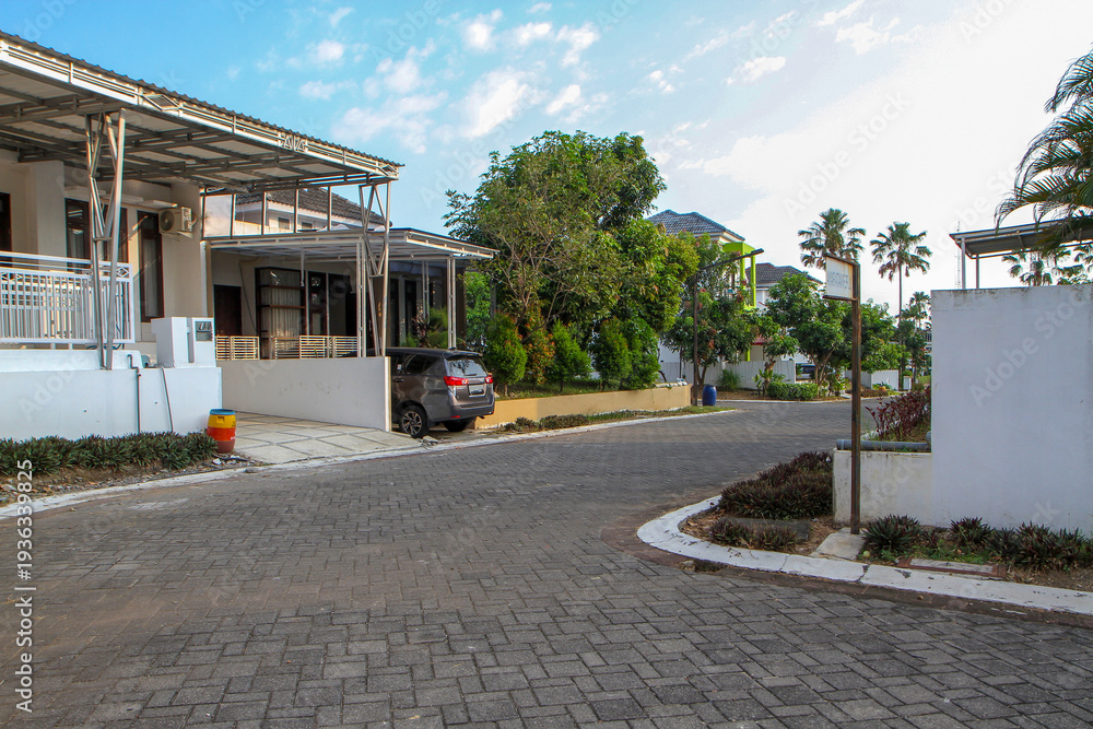 Naklejka premium Quiet Residential Street with Modern Houses in Semarang Indonesia