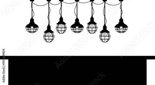 Industrial pendant lights hanging above a counter