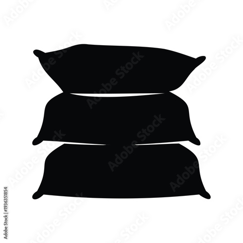Monochrome stack of three soft pillows silhouetted against a white background