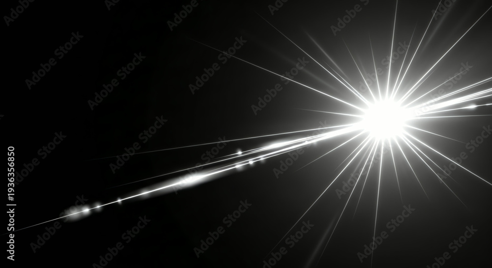 Fototapeta premium Bright Starburst Lens Flare Effect on Black Background