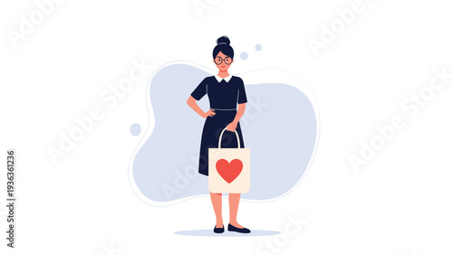 Young woman with glasses wearing a stylish dark dress while holding an eco-friendly tote bag decorated with a large red heart symbol.