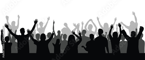 A large crowd of silhouetted people with arms raised in celebration