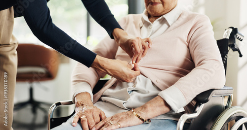 Foto Help, hands and nurse dressing old woman in wheelchair for hygiene, personal care or support
