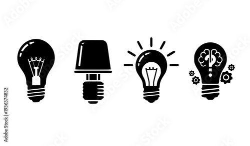 A set of four black and white light bulb icons in different designs
