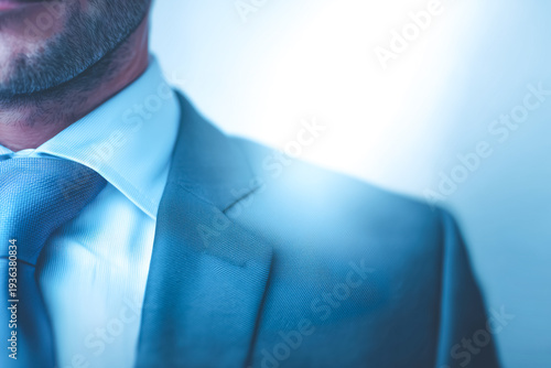 Professional Businessman in Sharp Blue Formal Suit and Tie Close-Up Detail Representing Leadership Corporate Success and Elegance.