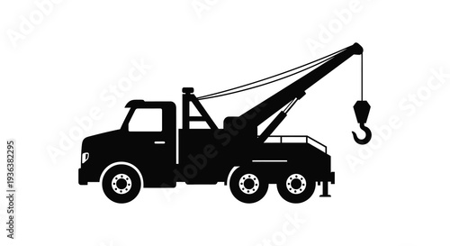 A stark black silhouette of a tow truck with a raised crane and hook silhouette high quality professional