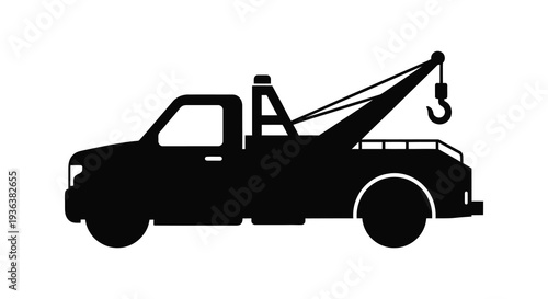 A stark black silhouette of a heavy duty tow truck with an extended boom and hook silhouette high quality