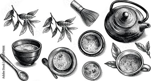 Traditional tea ceremony set with teapot, cups, and tea leaves