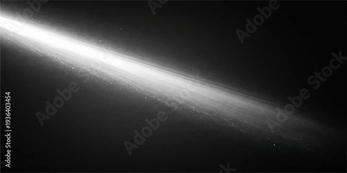 Shiny metallic spotlight on a dark theater stage casting a blue glow and bright rays against a black steel backdrop with a textured wall design