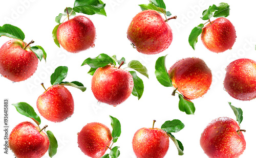 Juicy red apples with green leaves and water droplets, isolated on white background, concept of freshness and health