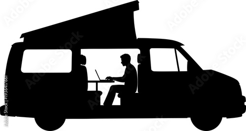 Digital nomad working on a laptop inside a camper van interior