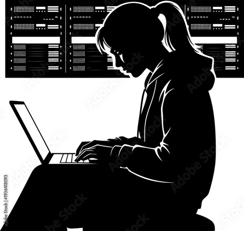 It specialist working on a laptop in a data center server room