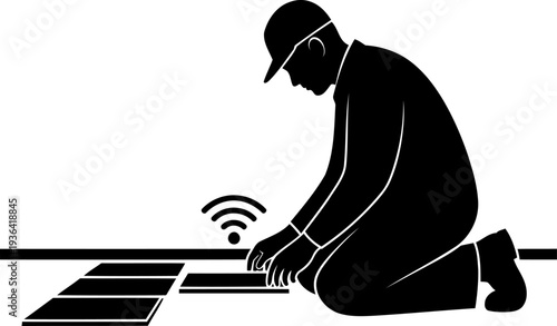 Technician installing smart flooring with wireless connectivity