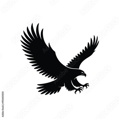 A striking silhouette of an eagle in mid flight wings fully extended