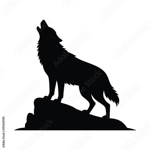 Silhouette of a howling wolf standing proudly on a rocky hill