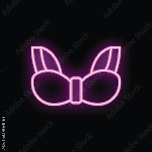 Bright pink neon sign in the shape of a bra, glowing on a dark background