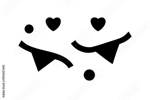 A cute emoticon with hearts for eyes and a smiling face