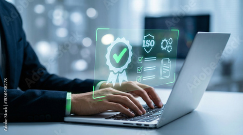 corporate professional types on laptop. ISO quality certification and compliance icons, document checklists conveying verification, standards, audit readiness and digital quality management assurance