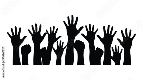 A group of raised hands in silhouette